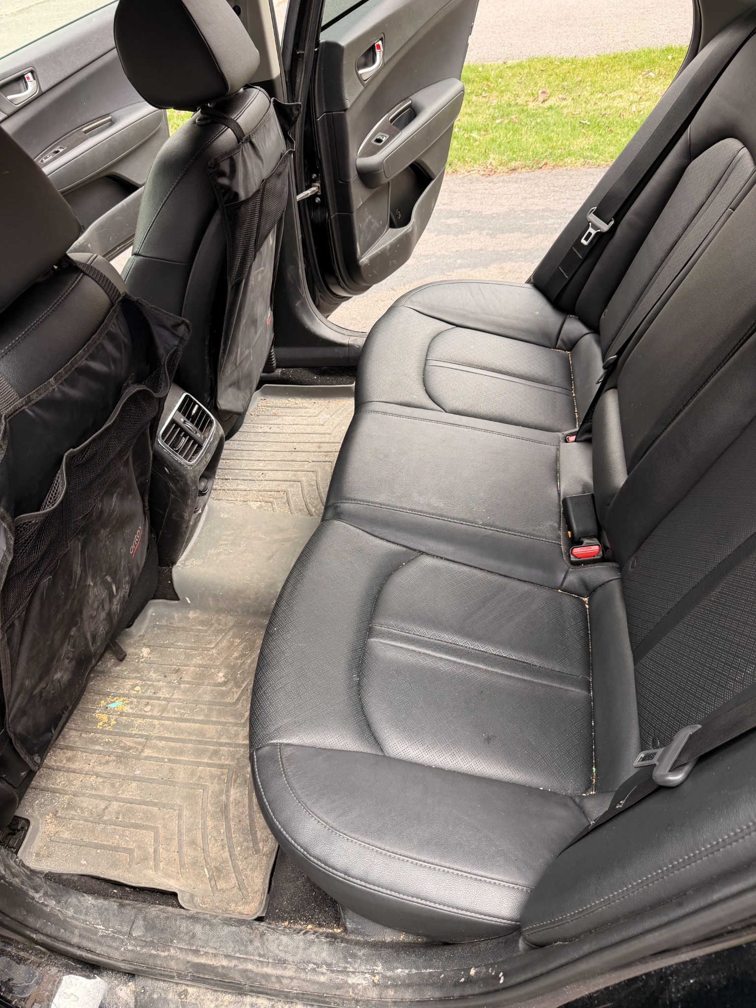 Before detailing: dusty rear seat and floor area