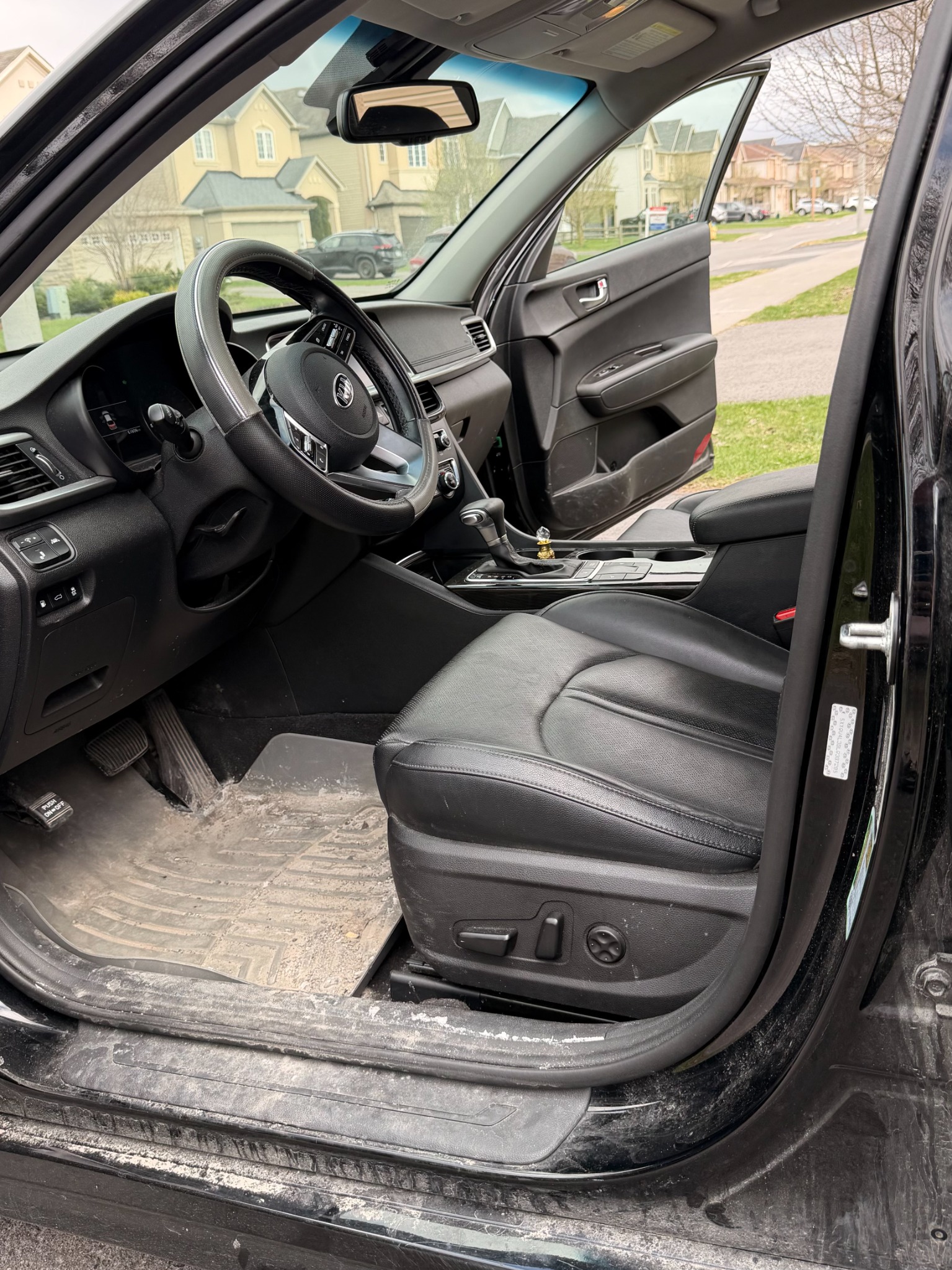 Before detailing: dusty driver floor and door sill